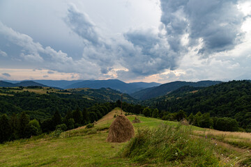 Haystack in a valley in the Carpathian Mountains