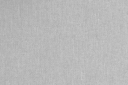 Light grey fabric cloth texture background, seamless pattern of natural textile.