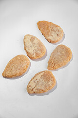 Dumplings with filling, frozen for cooking and frying