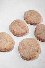 Dumplings with filling, frozen for cooking and frying