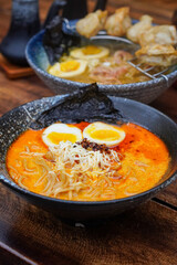 Indonesian-style ramen, captured on April 8, 2025. A savory noodle dish with rich broth, tender...