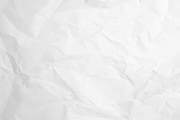 Obraz premium White Paper Texture background. Crumpled white paper abstract shape background with space paper for text. Clean white paper, wrinkled, abstract background.