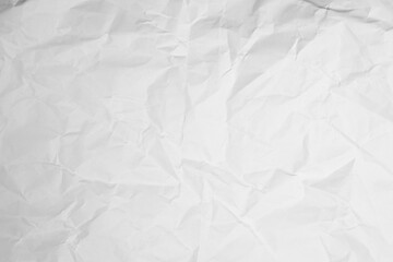 Obraz premium White Paper Texture background. Crumpled white paper abstract shape background with space paper for text. Clean white paper, wrinkled, abstract background.