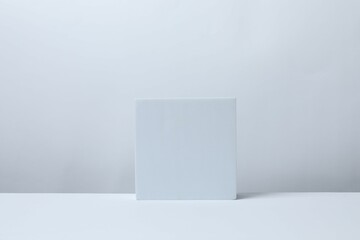 White podium on a light background