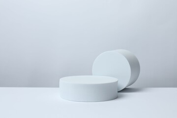 White podiums on a light background