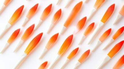 Pattern of orange and white candy corn pieces on a white background arranged diagonally in rows and columns