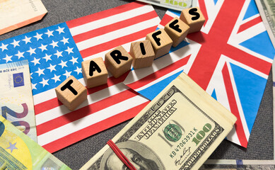  wooden cube block for tariffs on China flag and US flag.It is symbol of economic tariffs trade war...