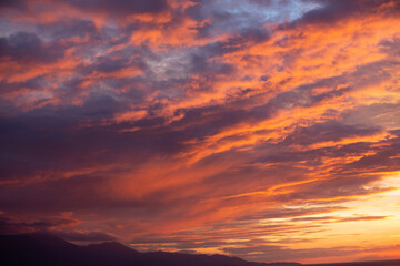 Sunset Over Coastal City and Sea in Greece