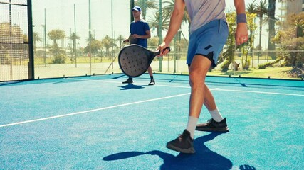 Sports, tennis court and men with padel for game, match and competition outdoors. Fitness, athlete and people with paddle ball for training, exercise and workout for tournament, challenge or practice