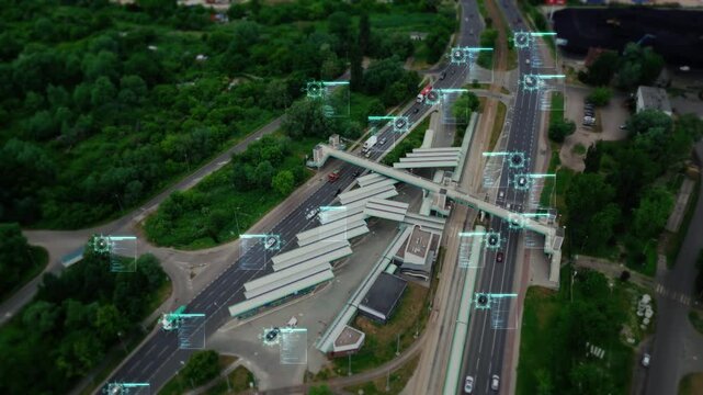Spy satellite drone monitors traffic on a busy freeway. Surveillance camera scans and identifies moving vehicles. High-tech city security system. Tracking criminals. AI scans surrounding environment. 