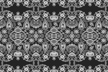 Seamless ethnic Ikat pattern in tribal, folk embroidery, and Mexican style Aztec geometry for Graphic Arts.