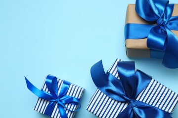 Beautiful gift boxes on color background