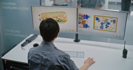 Airport Terminal Checkpoint: Female Security Officer Monitoring X-ray Scanning of Luggage on...