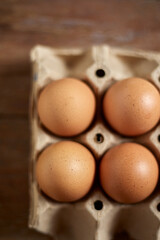 Close up brown eggs in egg box