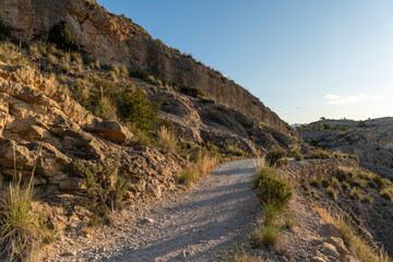 Beautiful scenery with winding gravel dirt road, Costa Blanca , Alicante, Spain