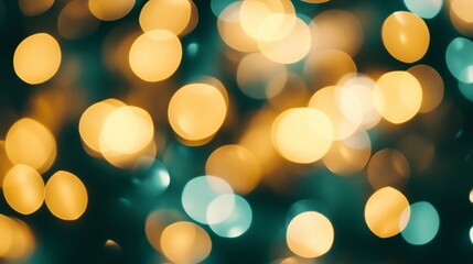 Fototapeta premium Blurred lights create a bokeh effect with gold and teal colors.