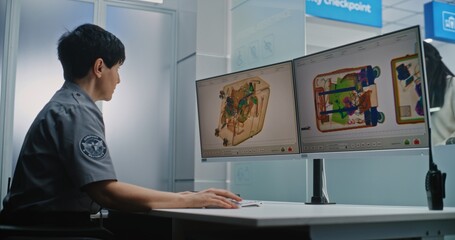 Airport Security Checkpoint: Female Security Officer Monitoring X-ray Scanning of Luggage on...