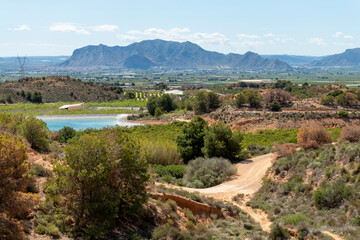 Fototapeta premium Beautiful scenery with winding gravel dirt road, Costa Blanca , Alicante, Spain - stock photo
