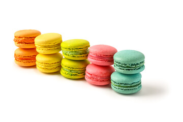 Different tasty sweet macaroons on white background