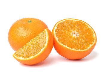 Halved and whole oranges. isolated on white background.