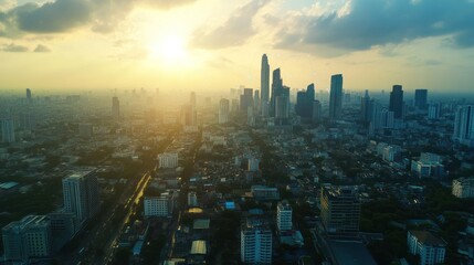 Aerial view of Bangkok city skyline at sunset. Possible use Stock photo for travel, architecture, or urban landscape