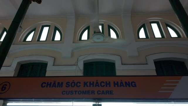 HO CHI MINH VIETNAM - 22nd SEPTEMBER 2024: A static shot inside Saigon Central Post Office in Ho Chi Minh City, Vietnam, showing a vintage fan and historic signage&mdash;capturing the building&rsquo;s colonial ch