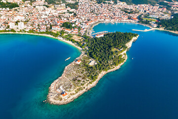Aerial panoramic view of Makarska town and St. Peter Forest Park in Dalmatia region, Croatia