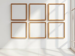 a white wall with 6 empty wooden frames, each row has 3 frames