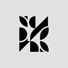 Geometric shapes forming a square pattern in black and gray