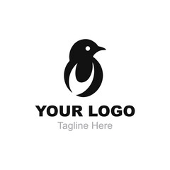 Black penguin with your logo and tagline here below. Suitable for branding, advertising, and marketing design projects targeting a diverse audience.