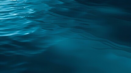 Fototapeta premium Water Surface: Deep Teal Waves Reflecting Light in Tranquil Harmony