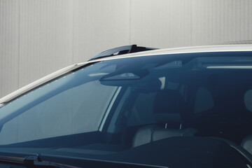 A modern subcompact crossover SUV in white with beautiful wheels and a large chrome grille.