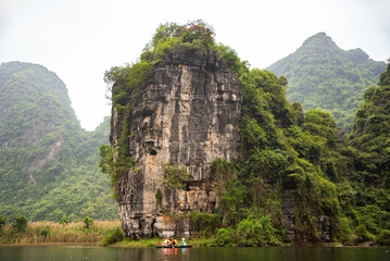 Lush vegetation and beautiful asian landscape at river in Ninh Binh, Vietnam