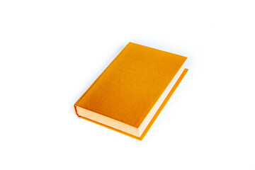 printed literary old book brown mustard color lies on white background with space for text