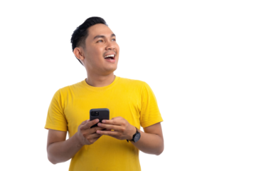Handsome Asian man using smartphone and looking up while smiling isolated on transparent background