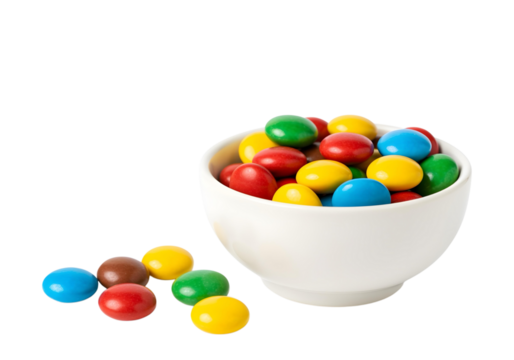 Colorful candies in bowl isolated on white background
