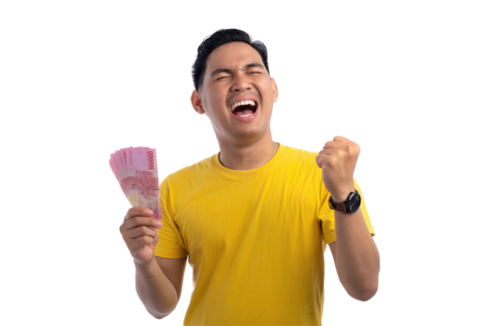 Excited handsome Asian man holding money and raising fist up isolated on transparent background - Powered by Adobe