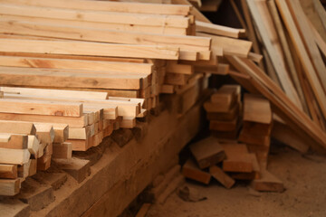 Stacks of wooden planks at sawmill, closeup