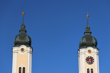 Clock tower in front of blue sky