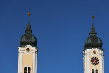 Clock tower in front of blue sky