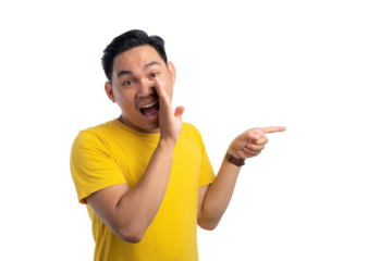 Handsome Asian man whispering to you and pointing finger at copy space isolated on transparent background