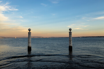 Fototapeta premium Two pillars in the river. Access point to Lisbon.