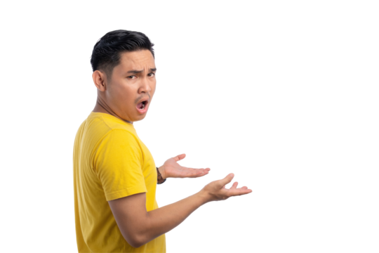 Shocked young Asian man looking confused while raising his hands and turning his head back isolated on transparent background