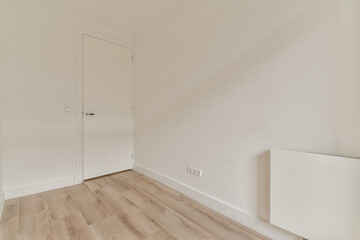 A clean and minimalist room interior showcasing simple design elements and neutral color tones,...
