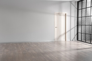 View of grey wall with door in room