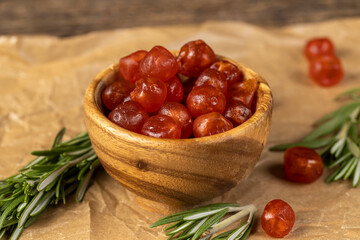 candied fruits of ripe orange kumquat, candied fruits of small fruits of kumquat, closeup