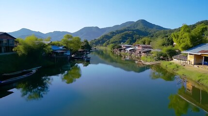 Fototapeta premium Serene Lakeside Village in Myanmar Houses Boats Mountains River Reflection