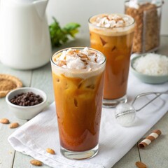 Iced coffee drinks with almonds and coconut on a light kitchen background