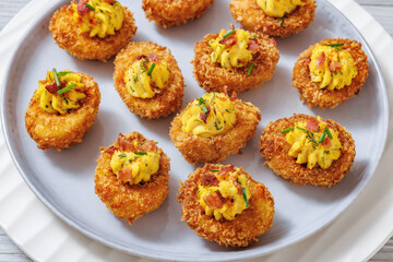Deep fried deviled eggs with coating of panko