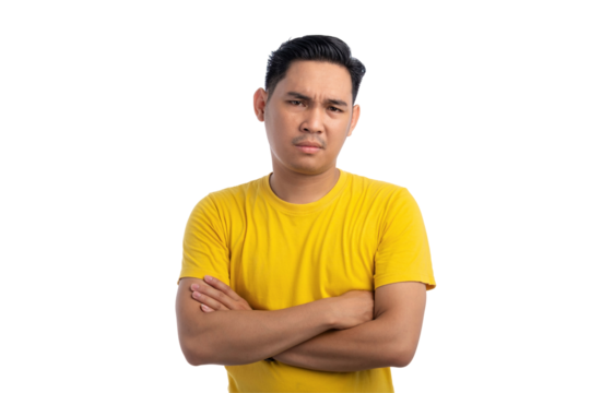 Handsome Asian young man keeping arms folded and looking at camera with skeptical expression isolated on transparent background - Powered by Adobe